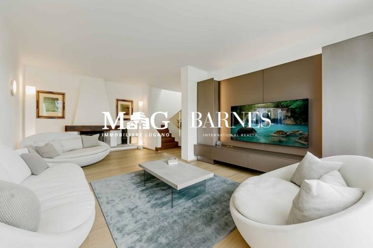 À Lugano, à quelques minutes du centre, maison moderne avec jardin privé et espace bien-être.