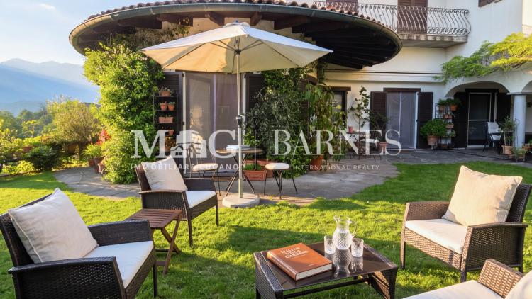 Comano : appartement de 4,5/5,5 pièces avec jardin et piscine privés
