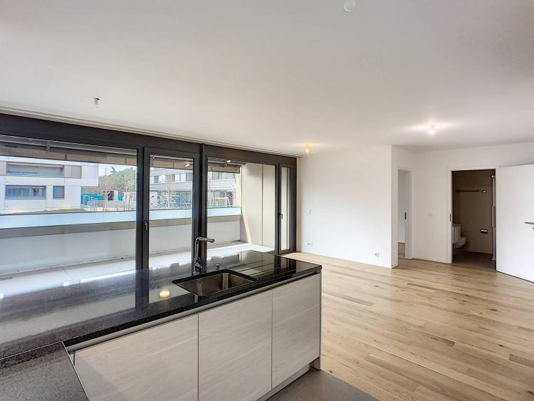 Élegant 2.5 pièces neuf au rez-de-chaussée